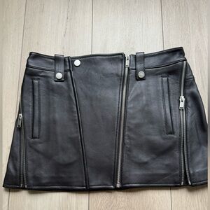 Dion Lee authentic biker leather mini skirt in black. Size US 2. NWT